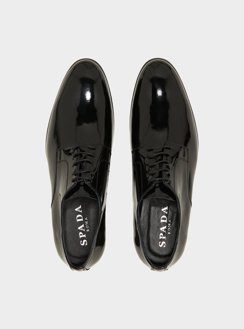 Derby lucida in pelle